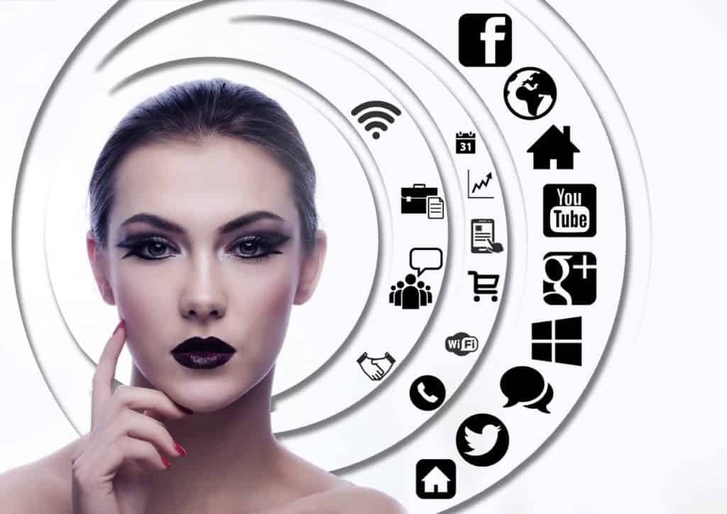 woman surrounded by social media icons