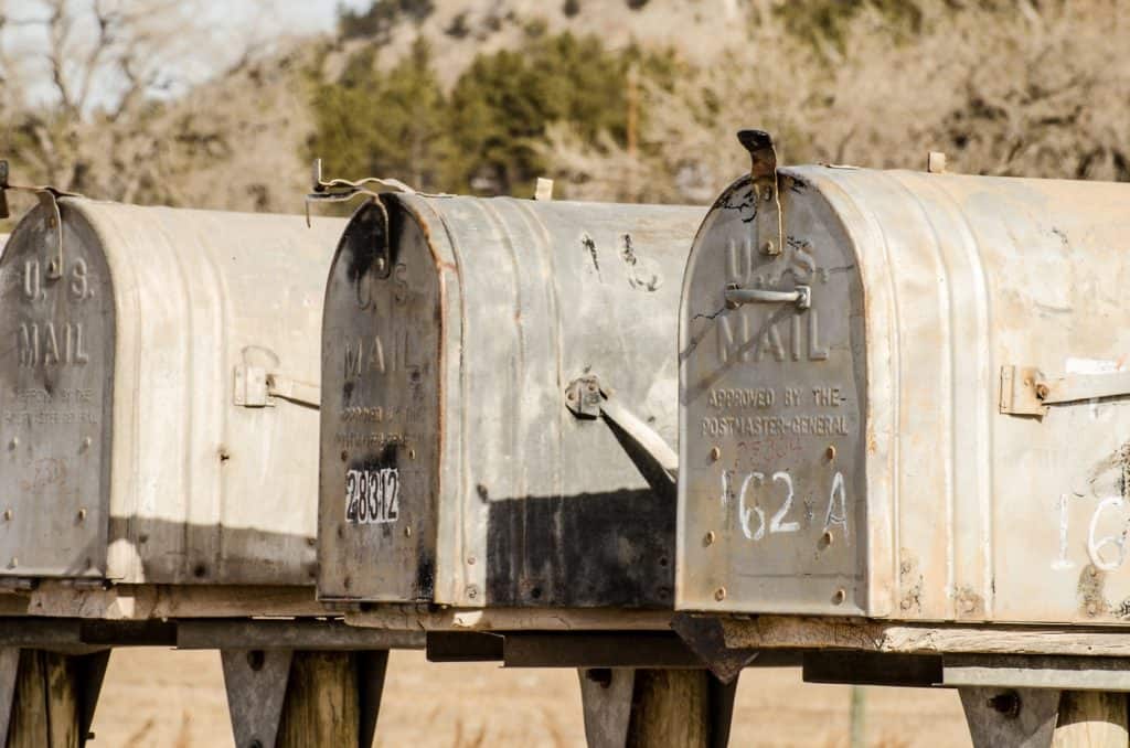 Row of grey American mailboxes